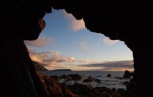 Water-cave by Wairaka Rock. According to Maori legend, Wairaka Rock is the petrified wife of the explorer Haunui (image by R. Moore).