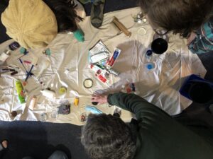 People sorting through waste products